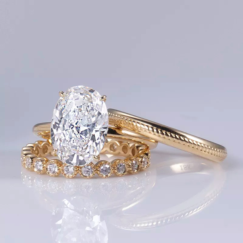 Gold Oval Cut Diamond Ring Set